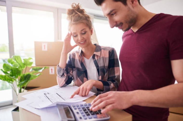 A couple planning a budget to move